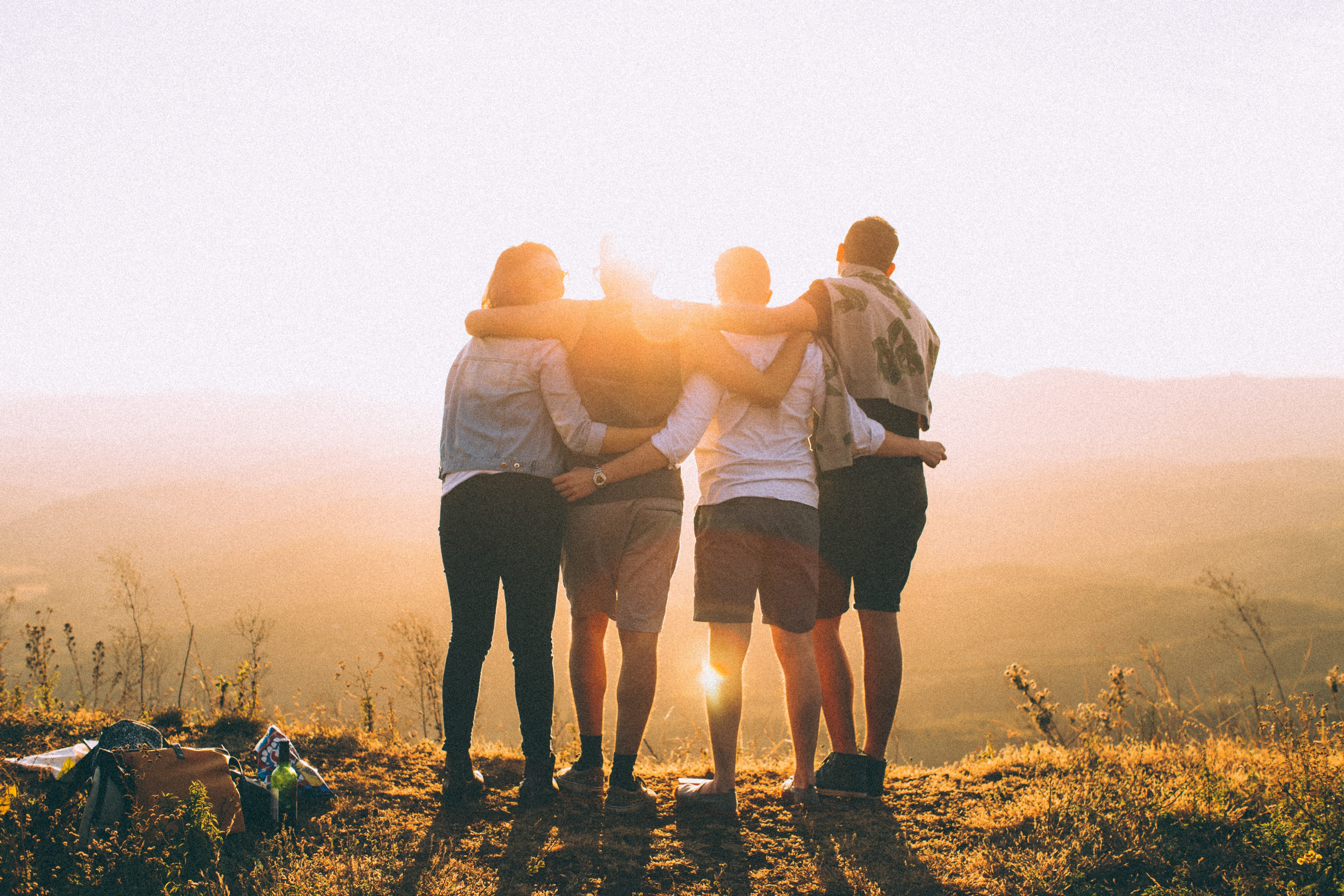 People hanging out while the sunset in the nature.